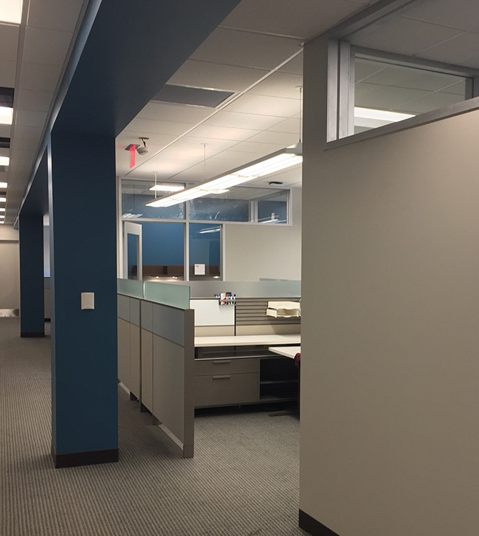 Cubical area with floor to ceiling posts