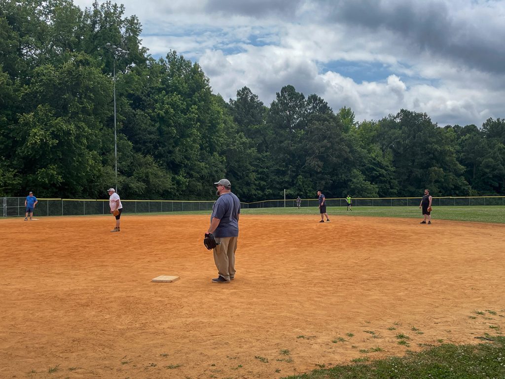 Facilities Services staff playing softball